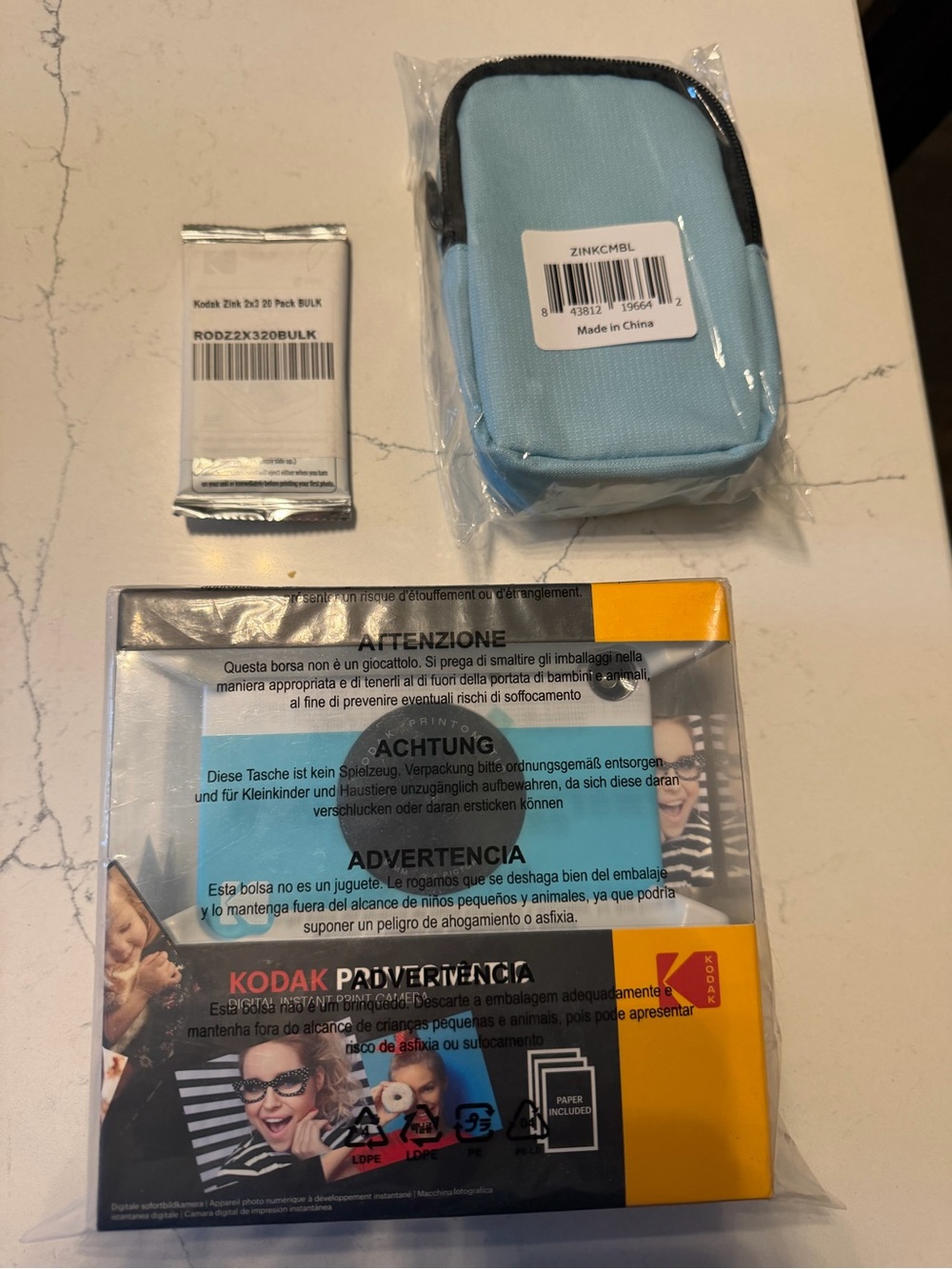 Kodak Printomatic Camera with Light Blue Zipper Pouch
